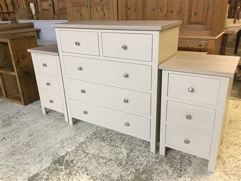 chest of drawers and matching bedside tables.